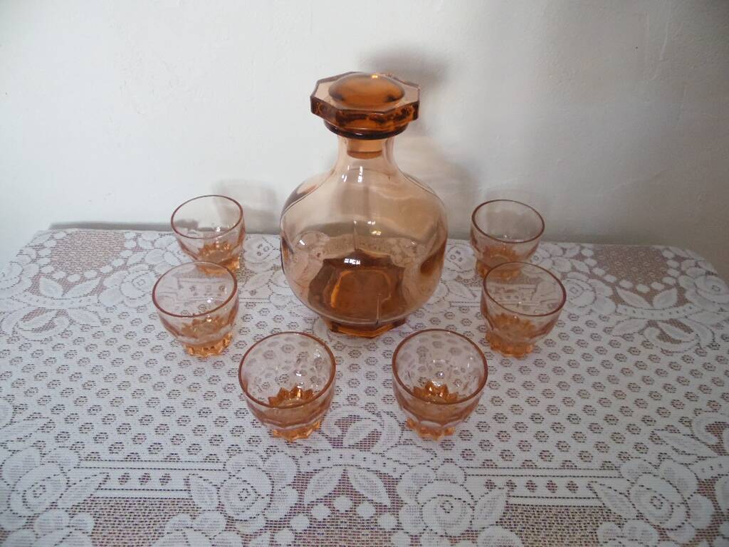 Pink glass liqueur carafe and 6 matching glasses