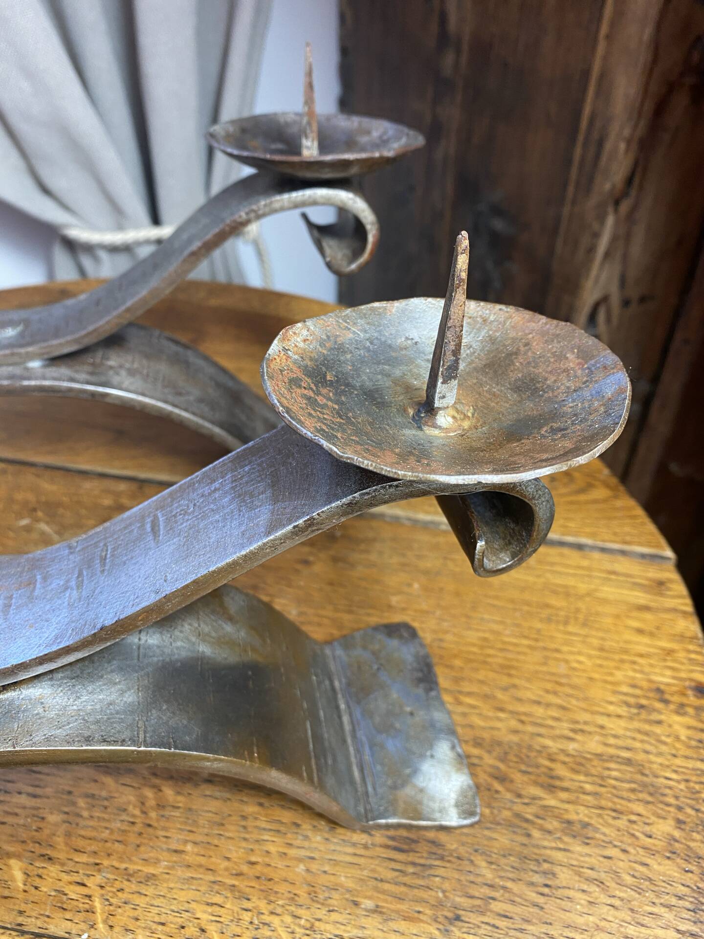 Brutalist wrought iron candlestick pair