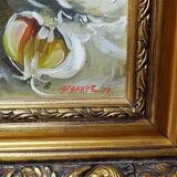 Still life with garlic, egg, and mortar signed Sarpe, 1979, oil on canvas.