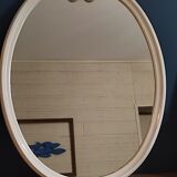 Oval mirror patinated white enamelled metal frame