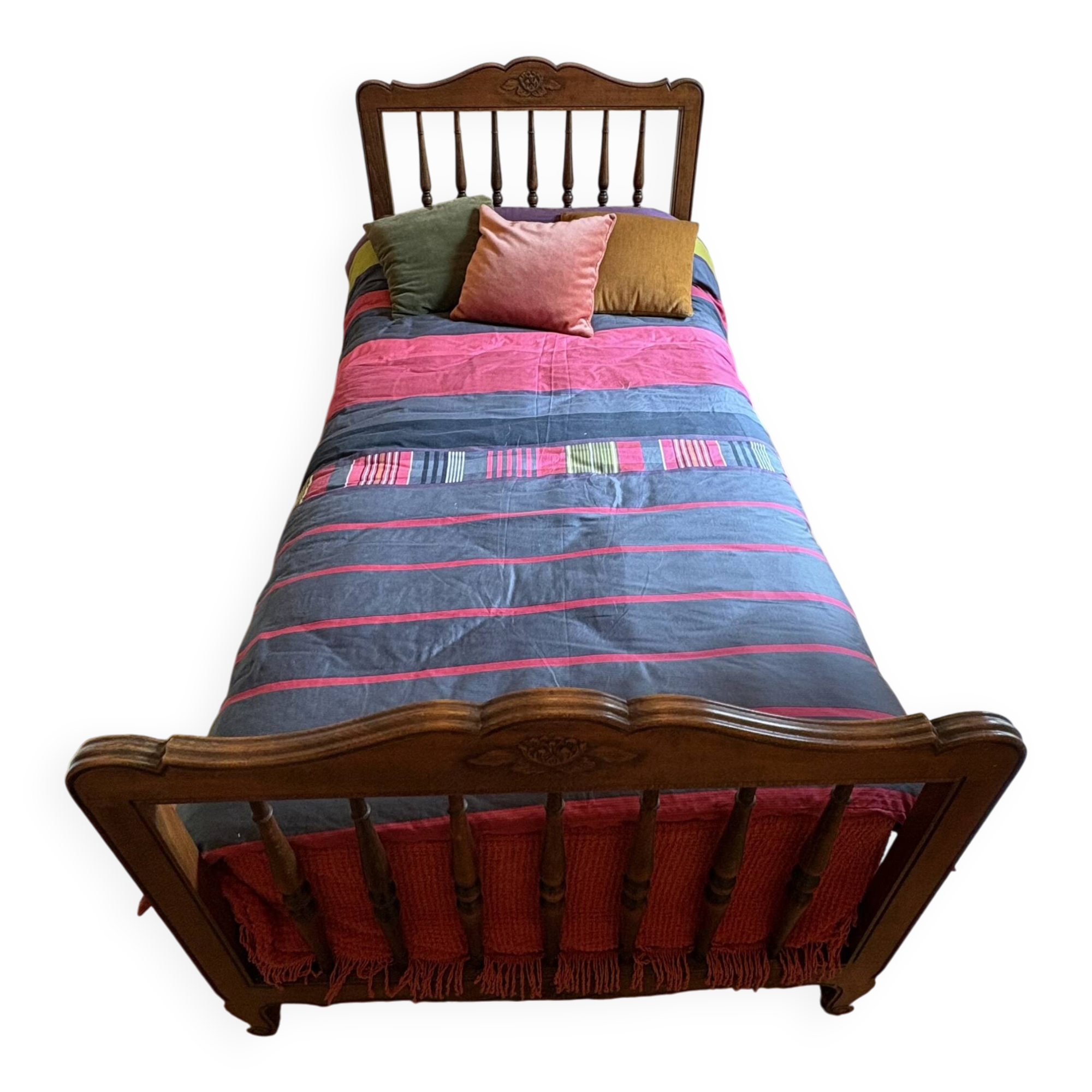 1 bed with a wooden frame and mattress