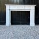 Louis XVI style fireplace in white Carrara marble, circa 1880.