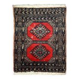 Tapis vintage fait main Lahore en laine rouge (45cm x 58cm) – Années 1970