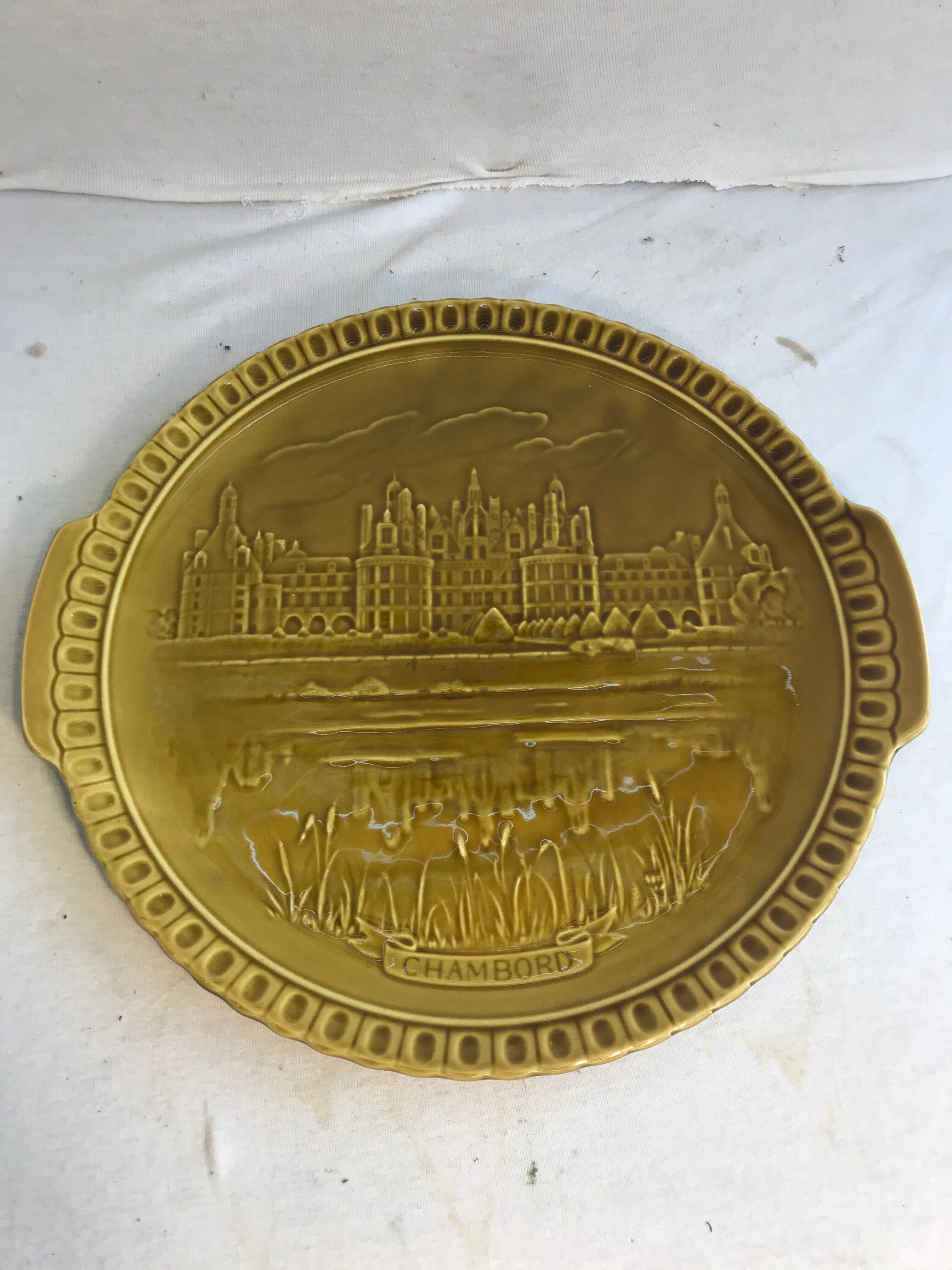 Old dish Gien, drawing chateau chambord in relief and vintage green ceramics