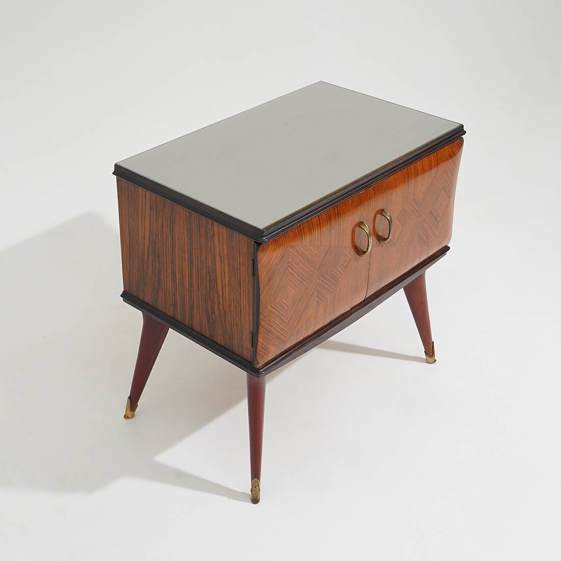 Pair of bedside tables with glass top, 1950s