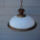 Suspension in white opaline, its edge in aged brass