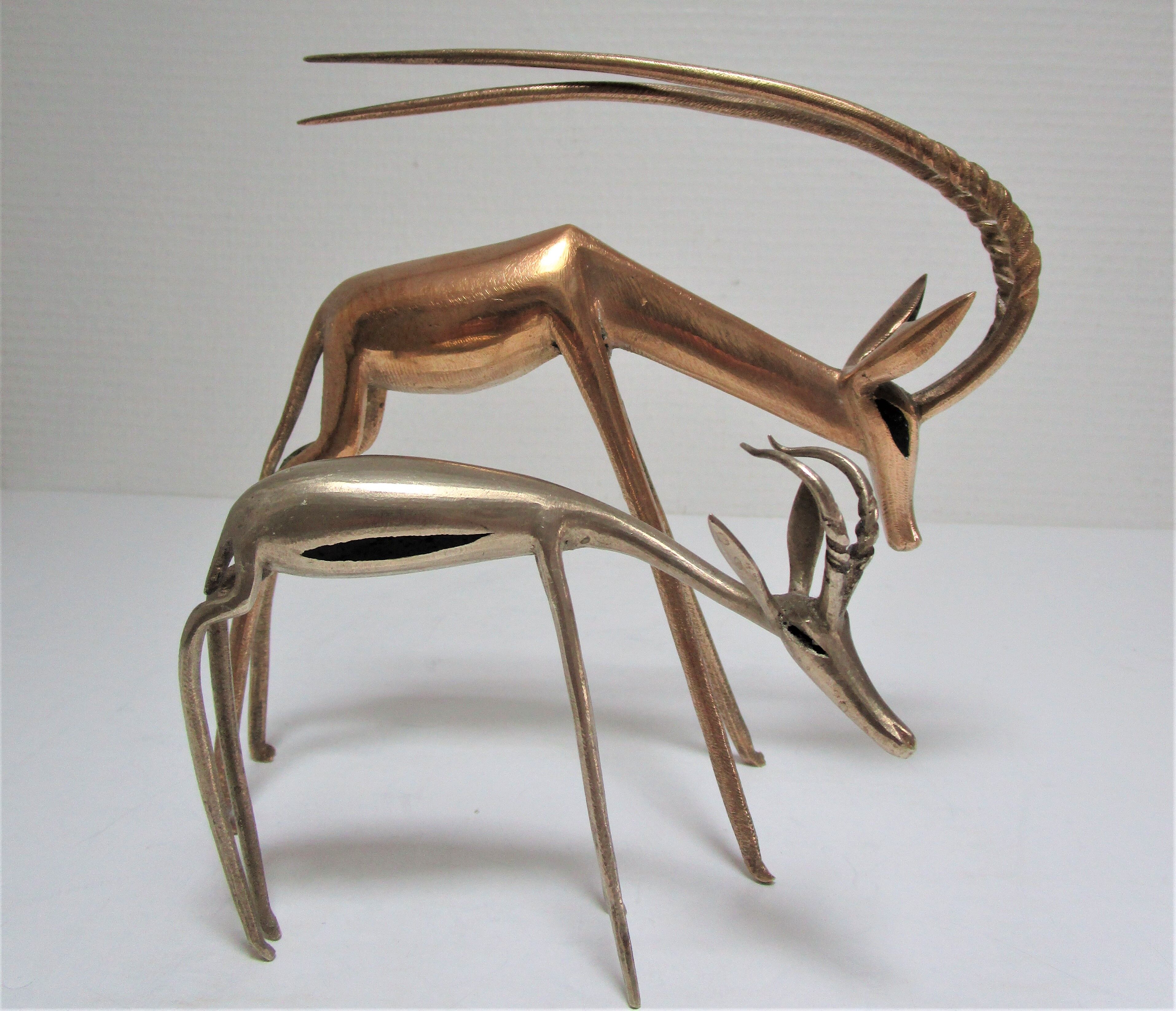 Four vintage brass antelope gazelles