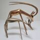 Four vintage brass antelope gazelles