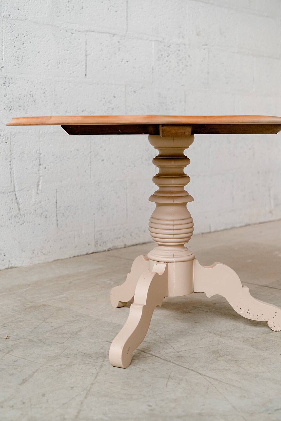 Old wooden pedestal table