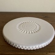 Pierre Motton glazed earthenware scalloped trivet for Gien