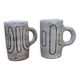 2 ceramic mugs signed db