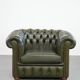 Magnifique fauteuil club en cuir de vachette verte de style anglais.