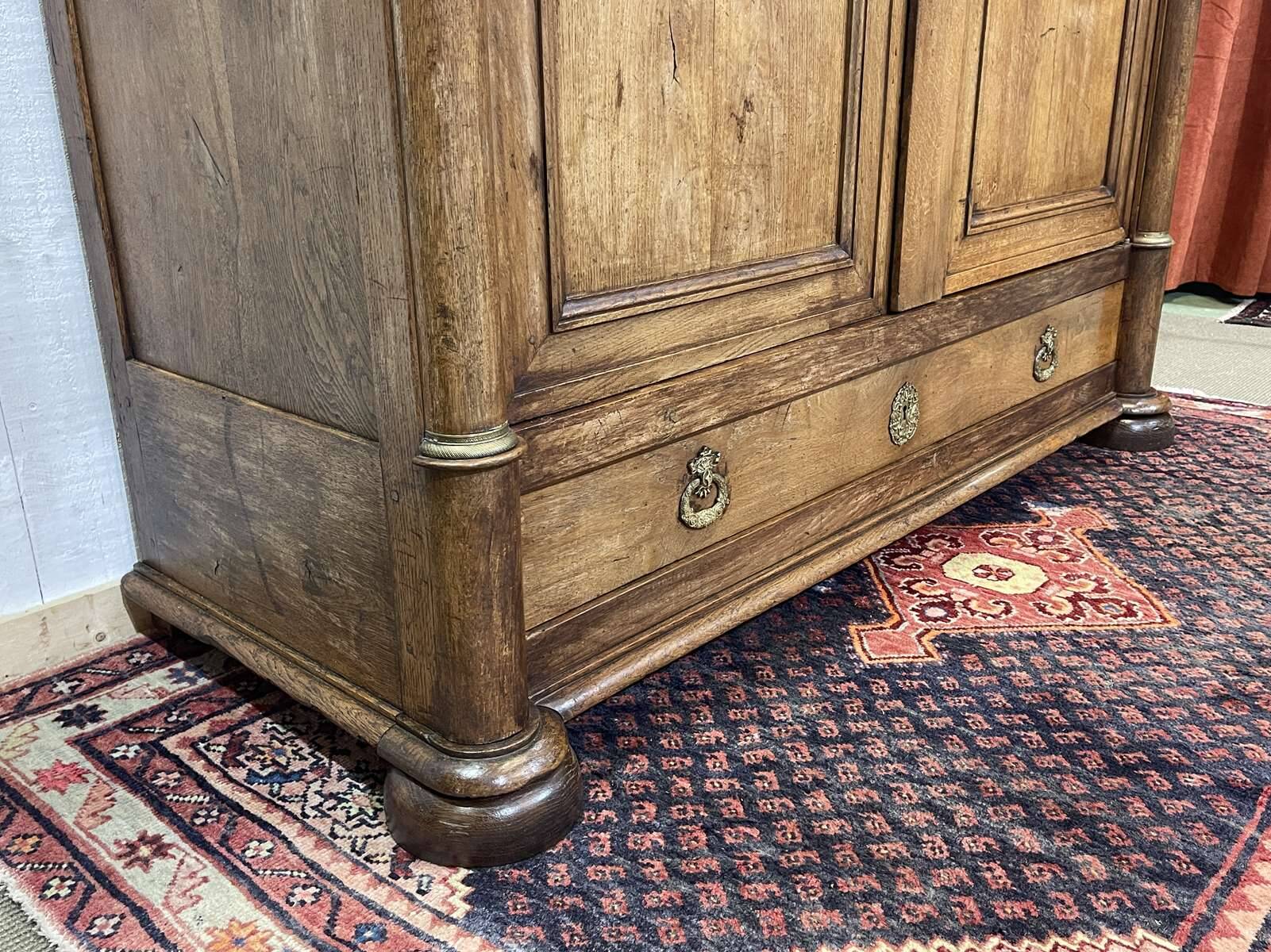Early 19th century Empire style oak wardrobe