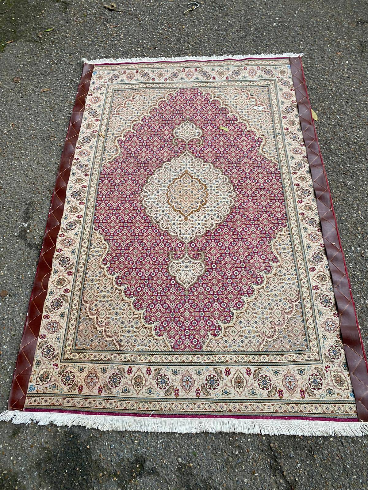 Handmade burgundy wool Persian rug 100x155cm