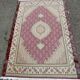 Handmade burgundy wool Persian rug 100x155cm