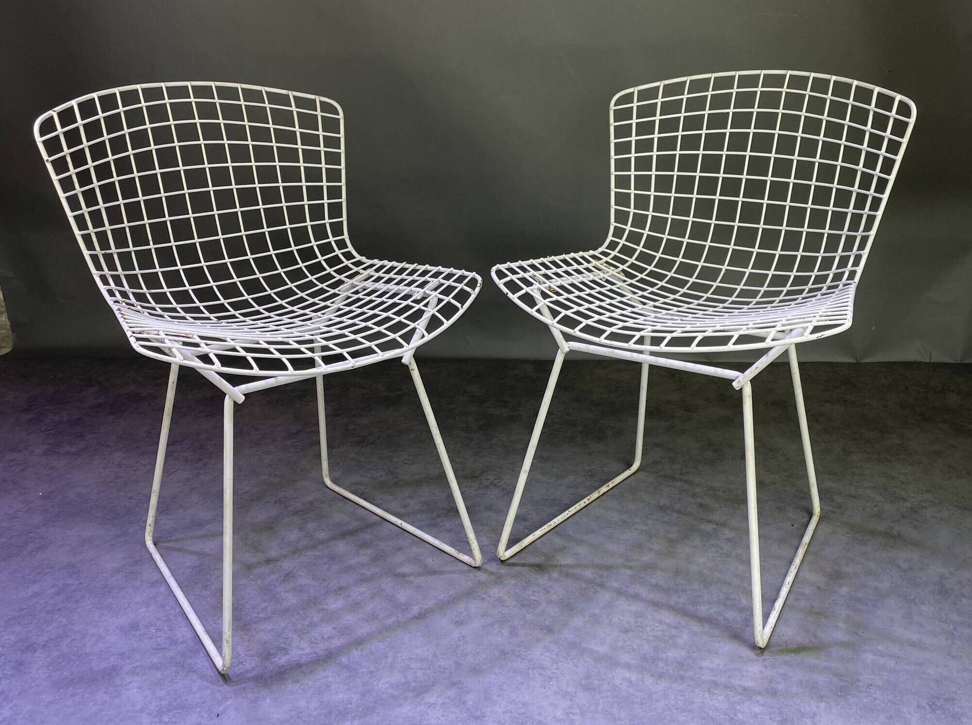 Pair of white lacquered Bertoia chairs
