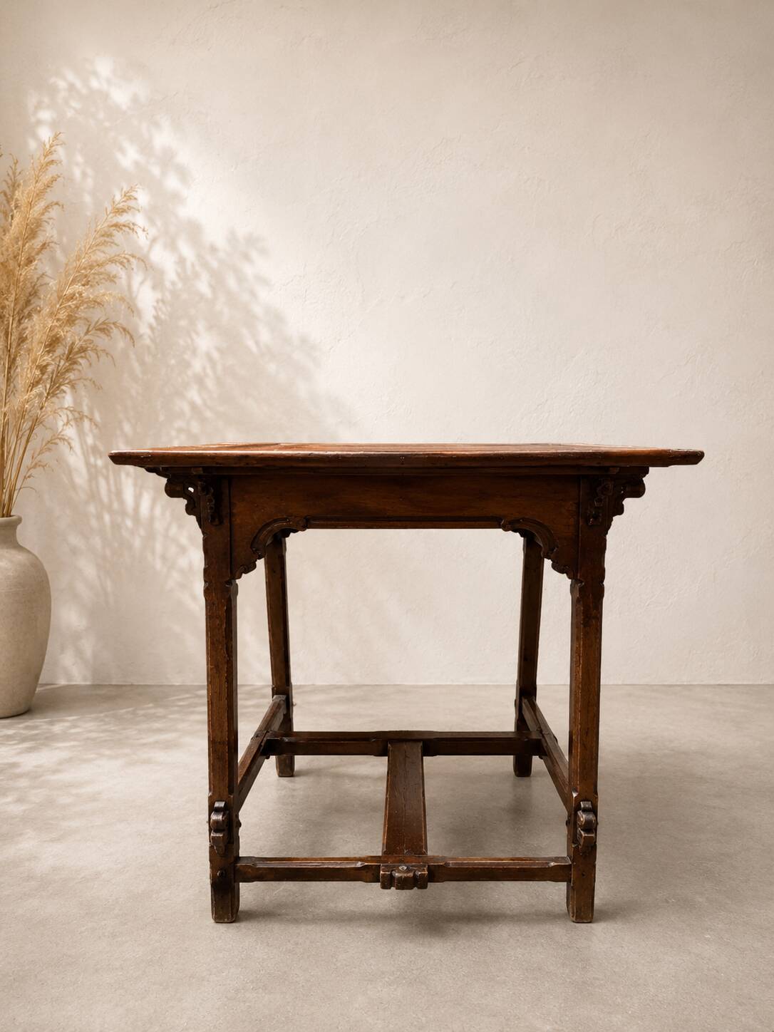 Occasional table or small antique display table in solid wood.