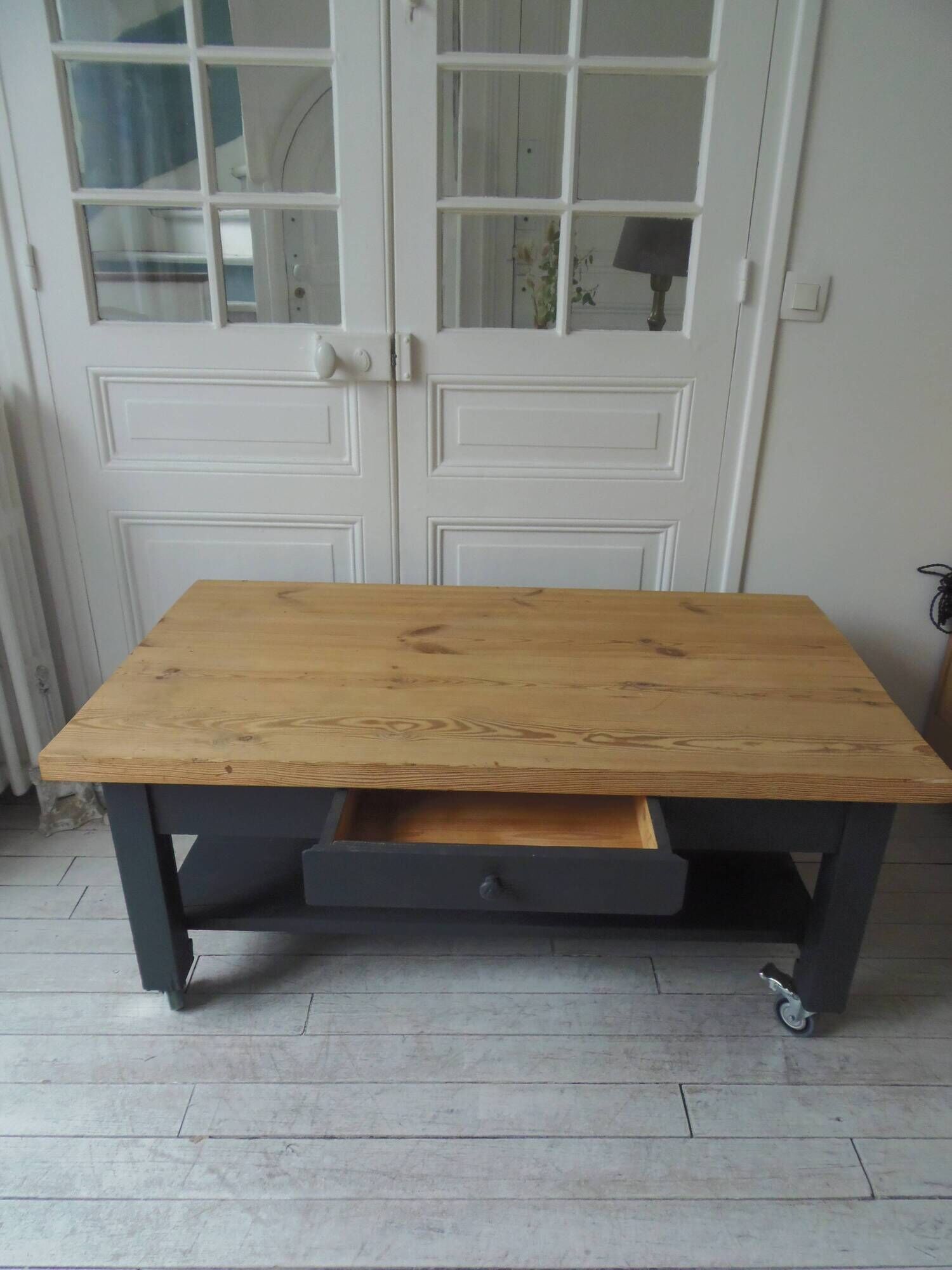 Coffee table on casters made from a vintage table, 1 drawer, 1 slate gray shelf.