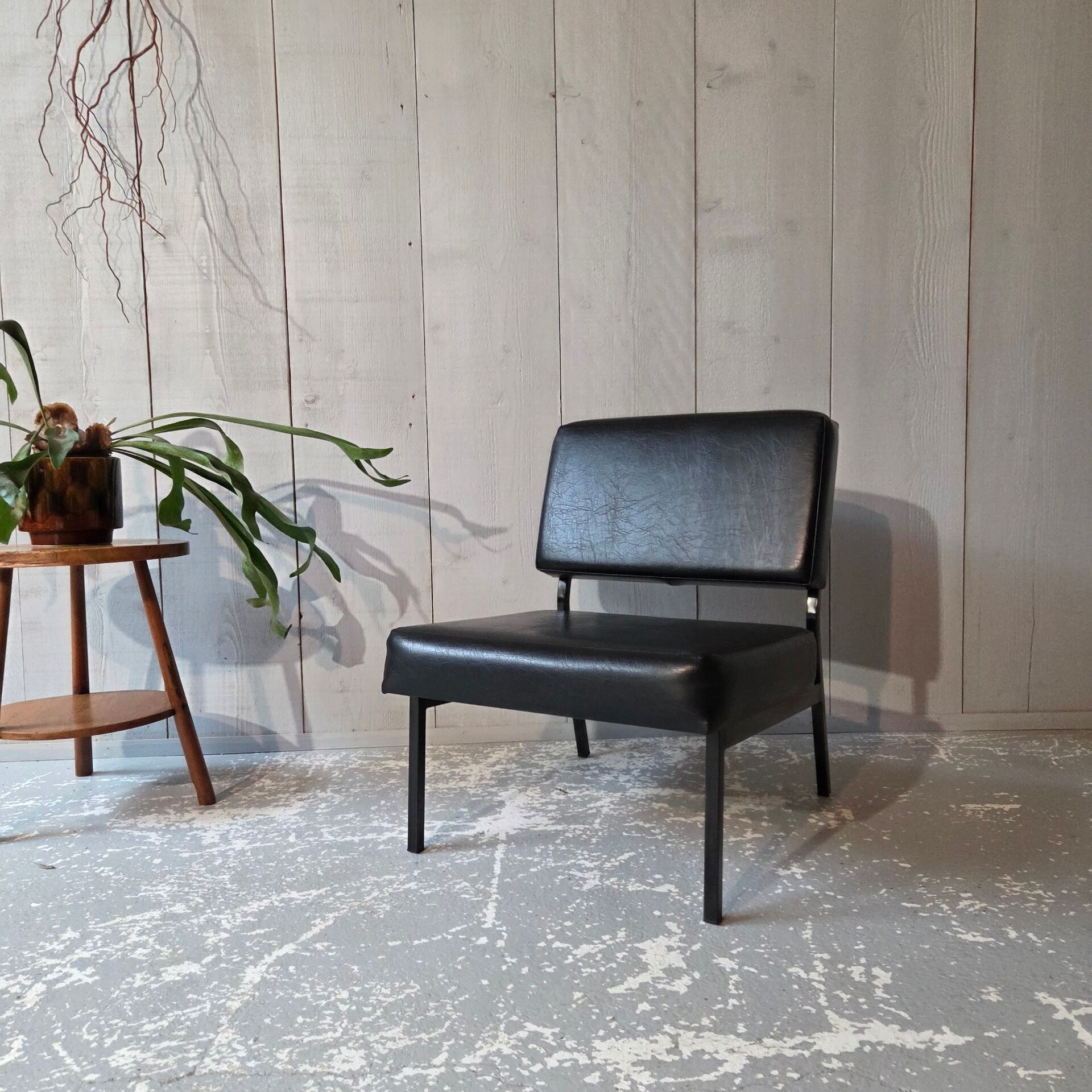 2 faux leather armchairs