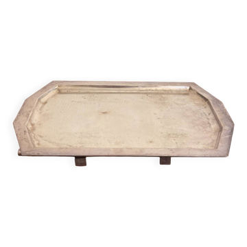 Art Deco metal plate, silvered, hammered on a flat vintage serving stand.