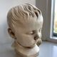 Child bust made from resin by Antoine Paridon, signed 240 A.P.