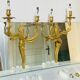 St Louis XV wall lights in solid gilded bronze with curved branches.