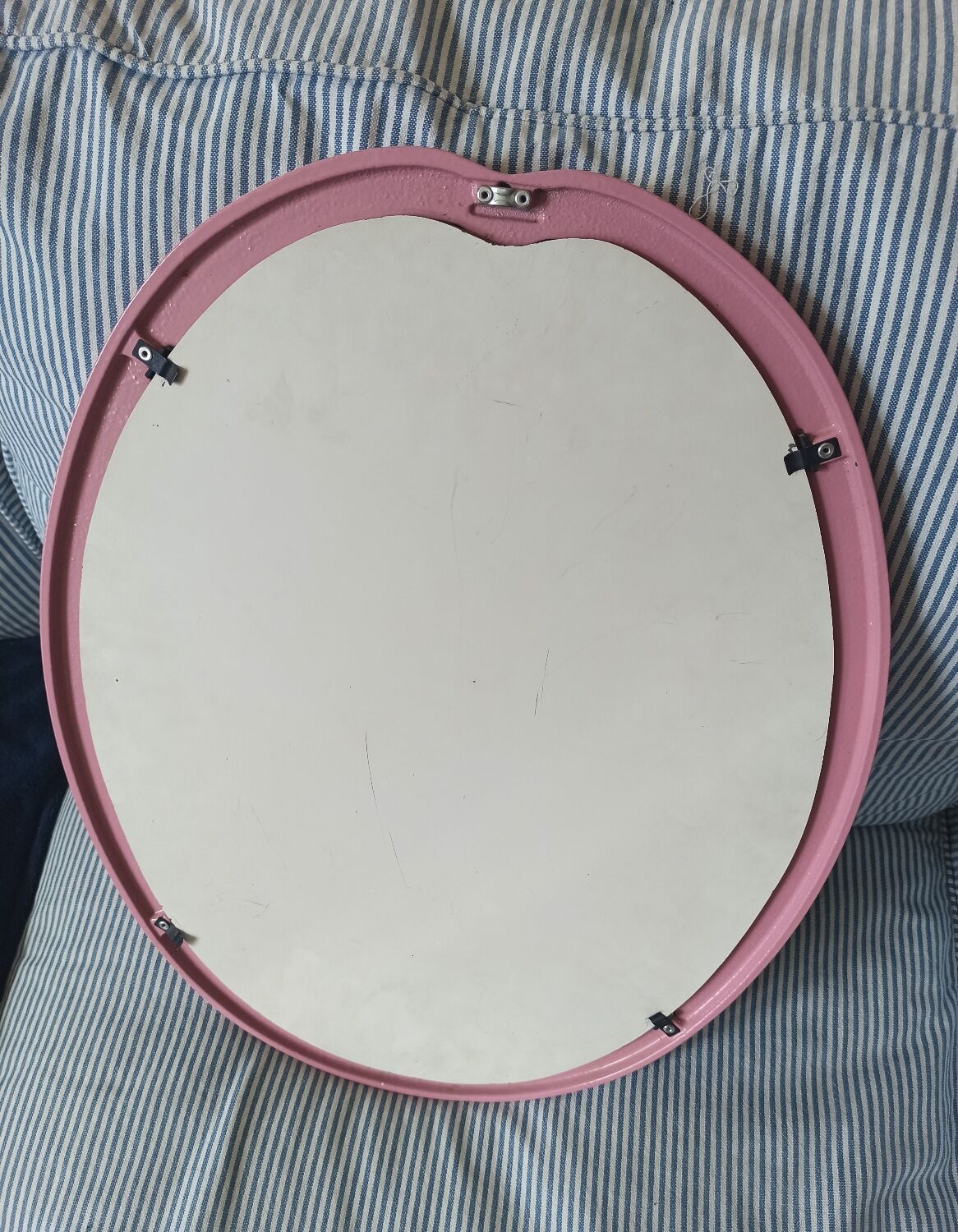 Vintage pink oval cast iron mirror