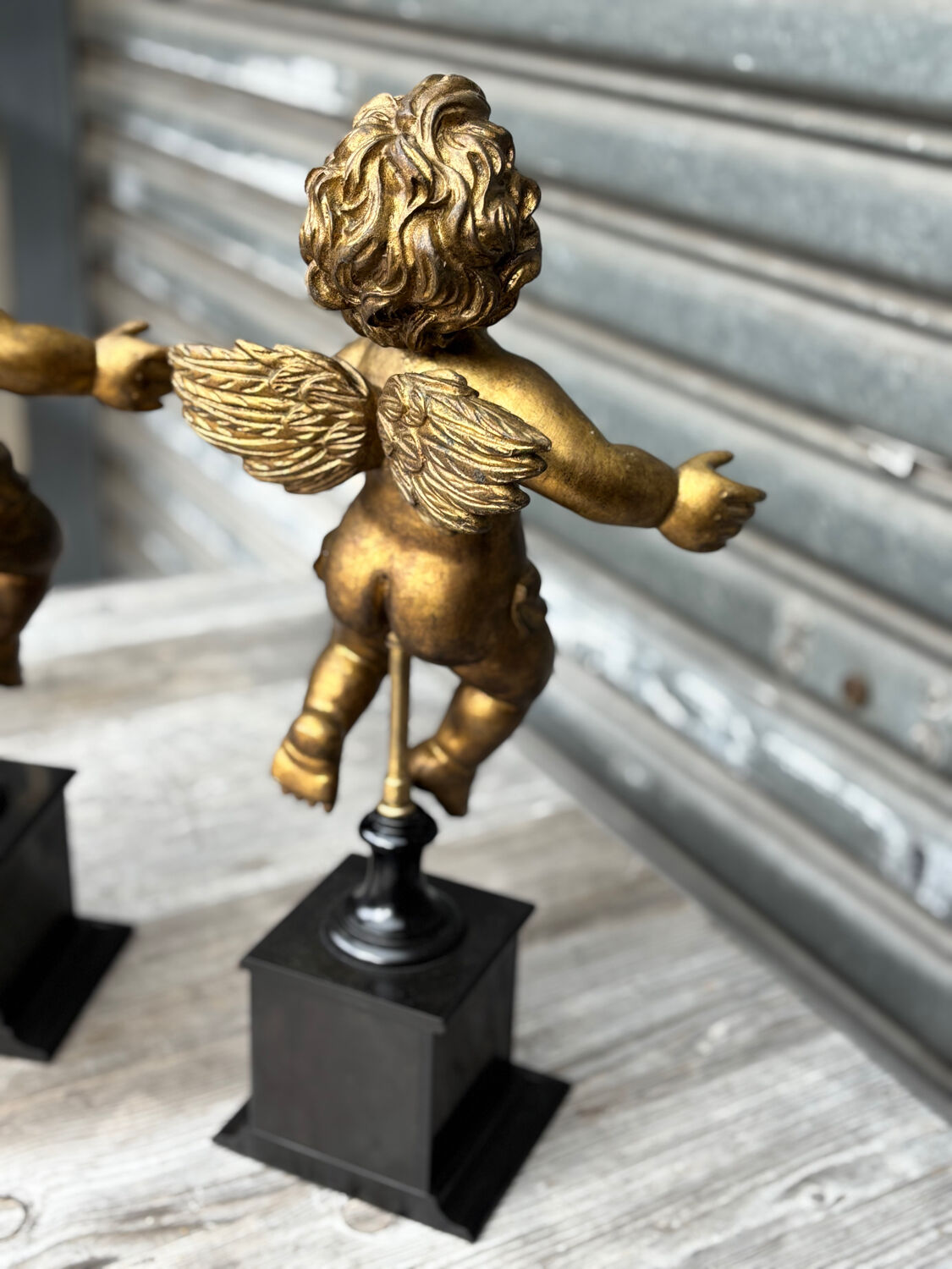 Pair of gilded cherubs on a Napoléon III base