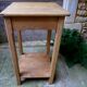 antique tall fir wood side table, a piece of workshop furniture