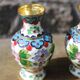 Two small vintage cloisonné enamel vases with Asian floral decoration.