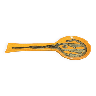 Orange ceramic spoon rest entirely handmade.