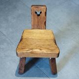 Tripod chair for children, Scandinavian brutalist chalet design.