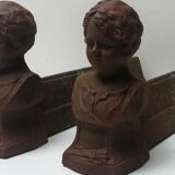 Pair of cast iron fireplace chenets "children"