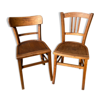 Pair of mismatched bistro chair