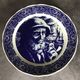 Blue enamelled earthenware wall plate with fisherman decor, Boch La Louvière, Belgium