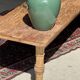 Brown Indonesian teak coffee table, with a border and cylindrical legs H40 L103.