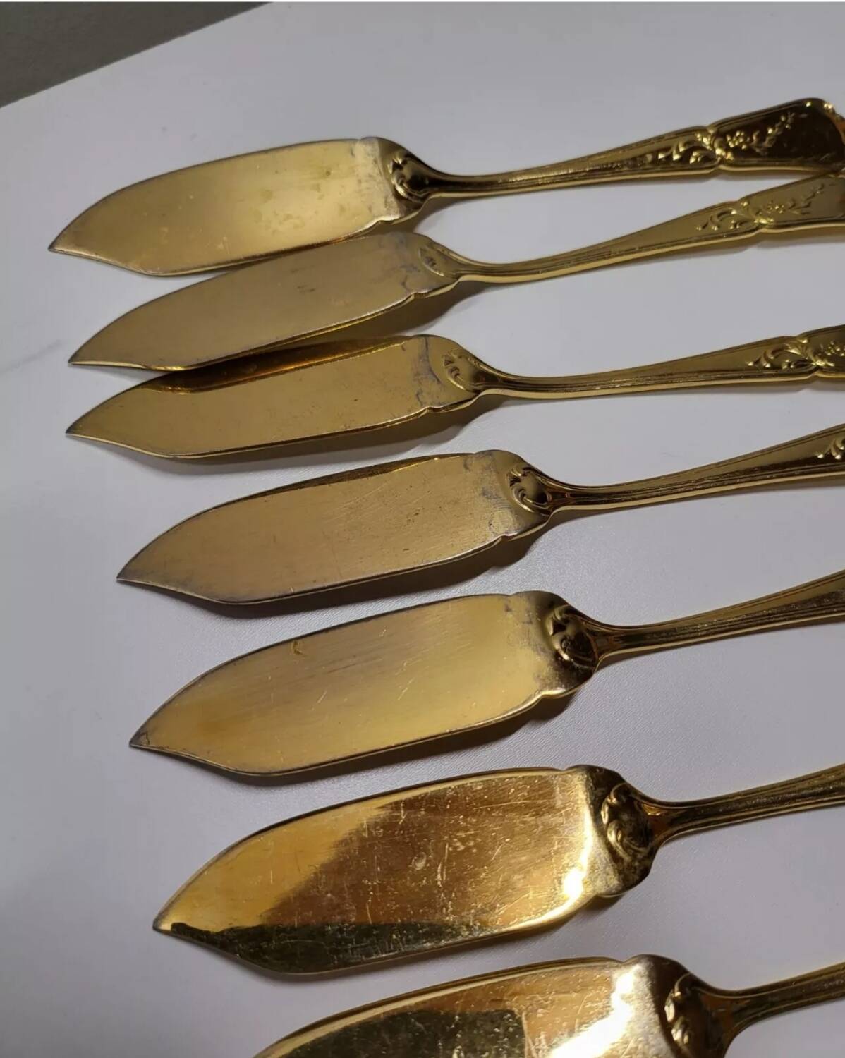 Gold metal fish cutlery, knives and forks 24 pieces