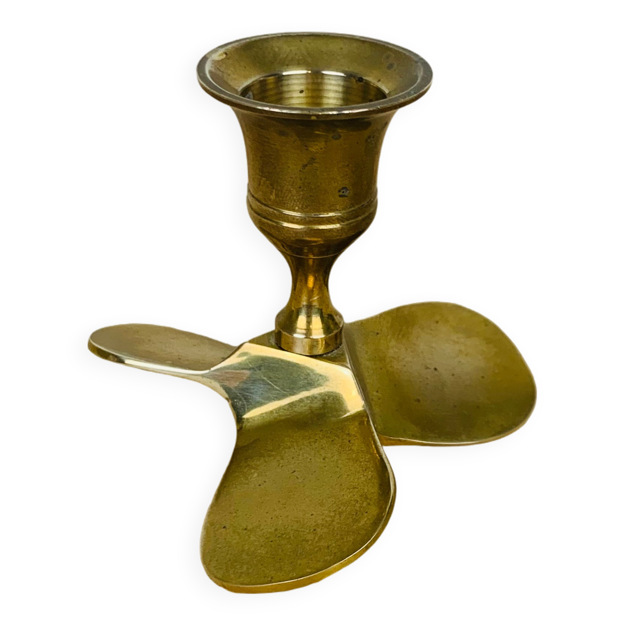 Golden brass propeller candle holder