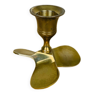 Golden brass propeller candle holder