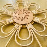 Flower-shaped rattan mirror, 55 cm