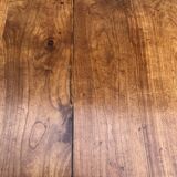 Antique solid cherry farmhouse table with 2 end drawers and 1 pull-out.