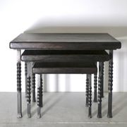 Brutalist nesting table in ebonized oak and wrought iron