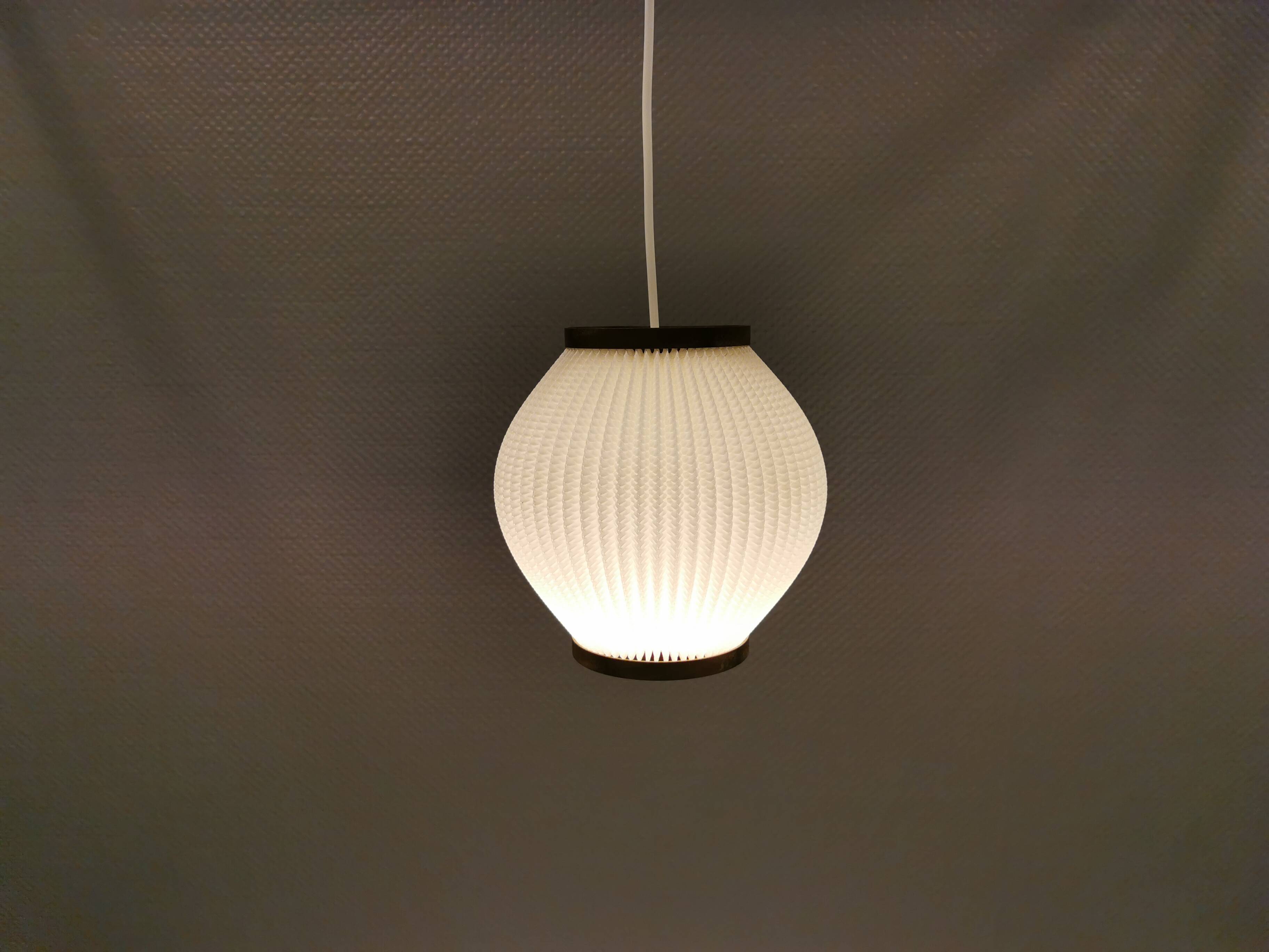Pleated hanging lamp model Pearl Shade, produced by Hoyrup Light and designed by Lars E Schøiler