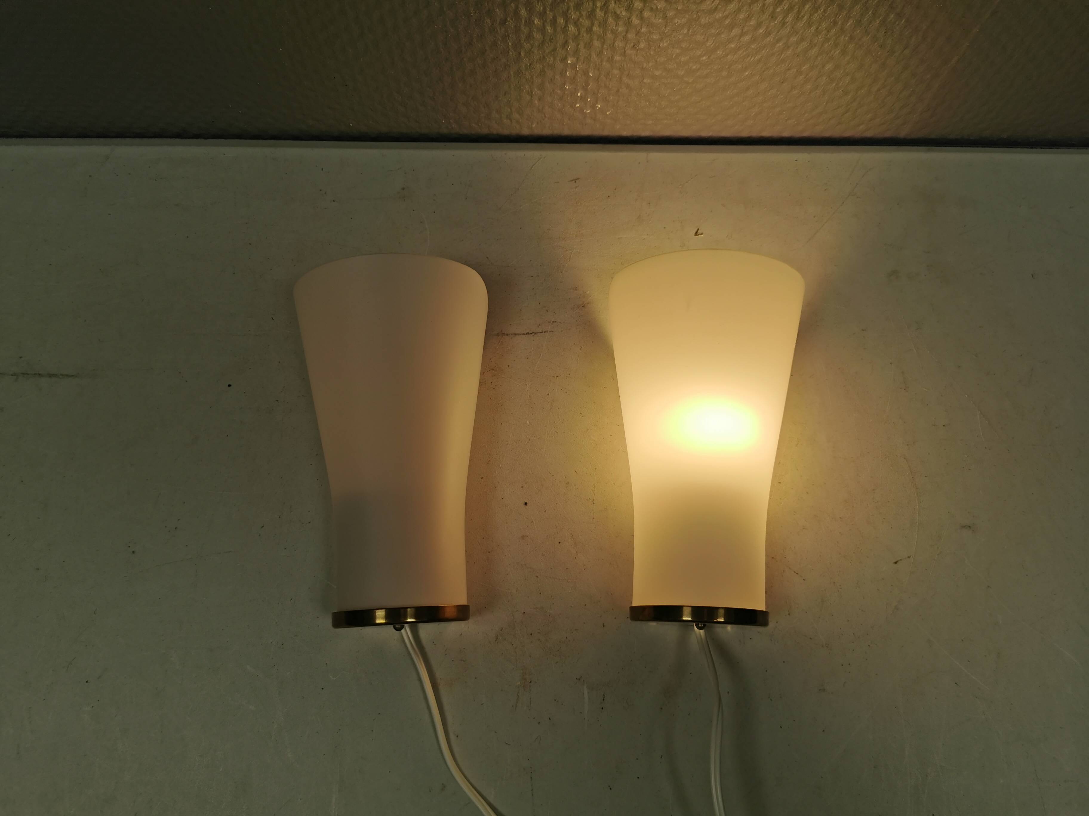 A set of retro wall lamps with white opal glass shades, Denmark 1950s
