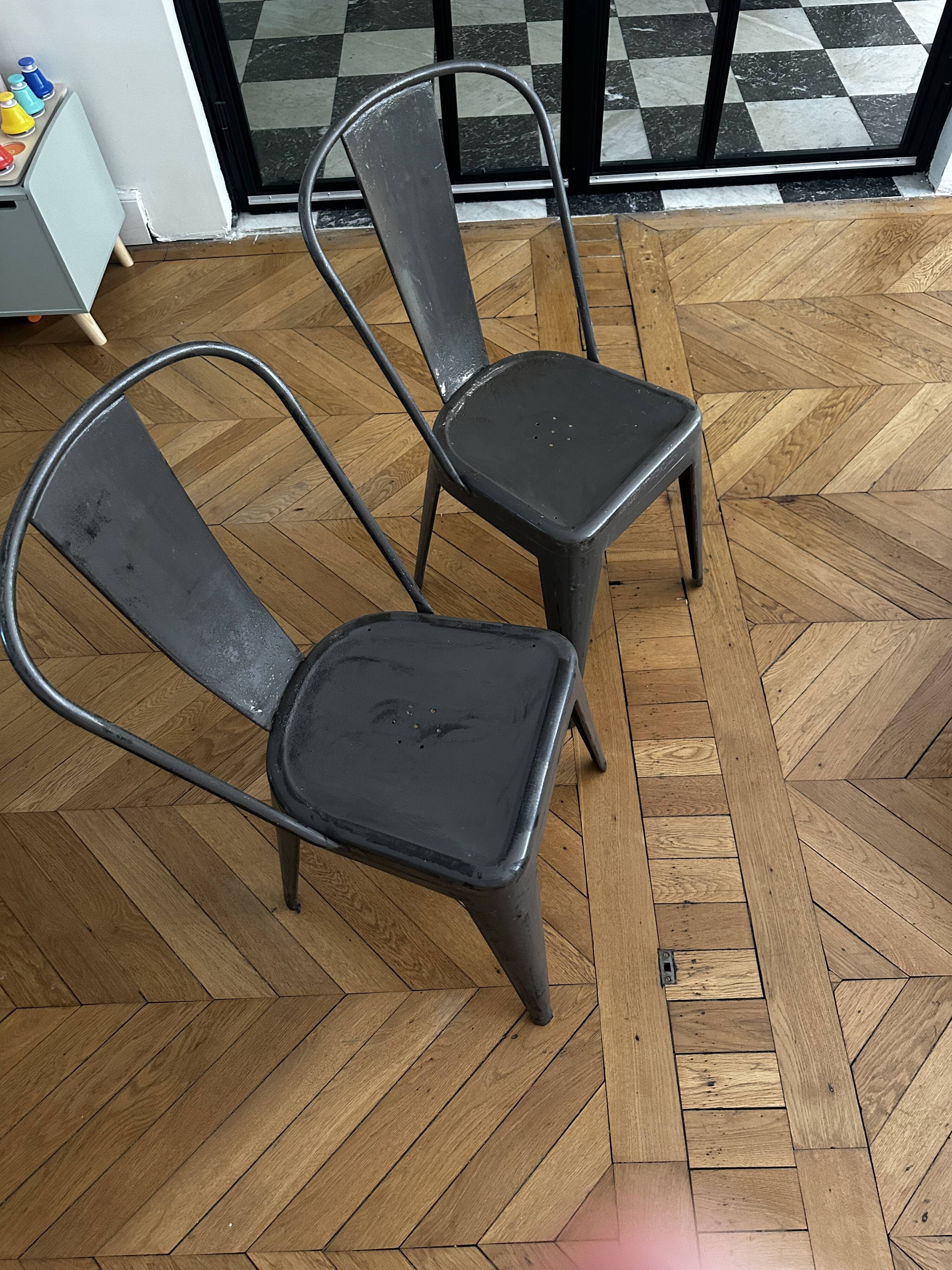 Pair of vintage Tolix model A chairs, designed by Xavier Pauchard.