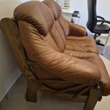 Vintage Scandinavian two-seater sofa in cognac leather and solid oak.