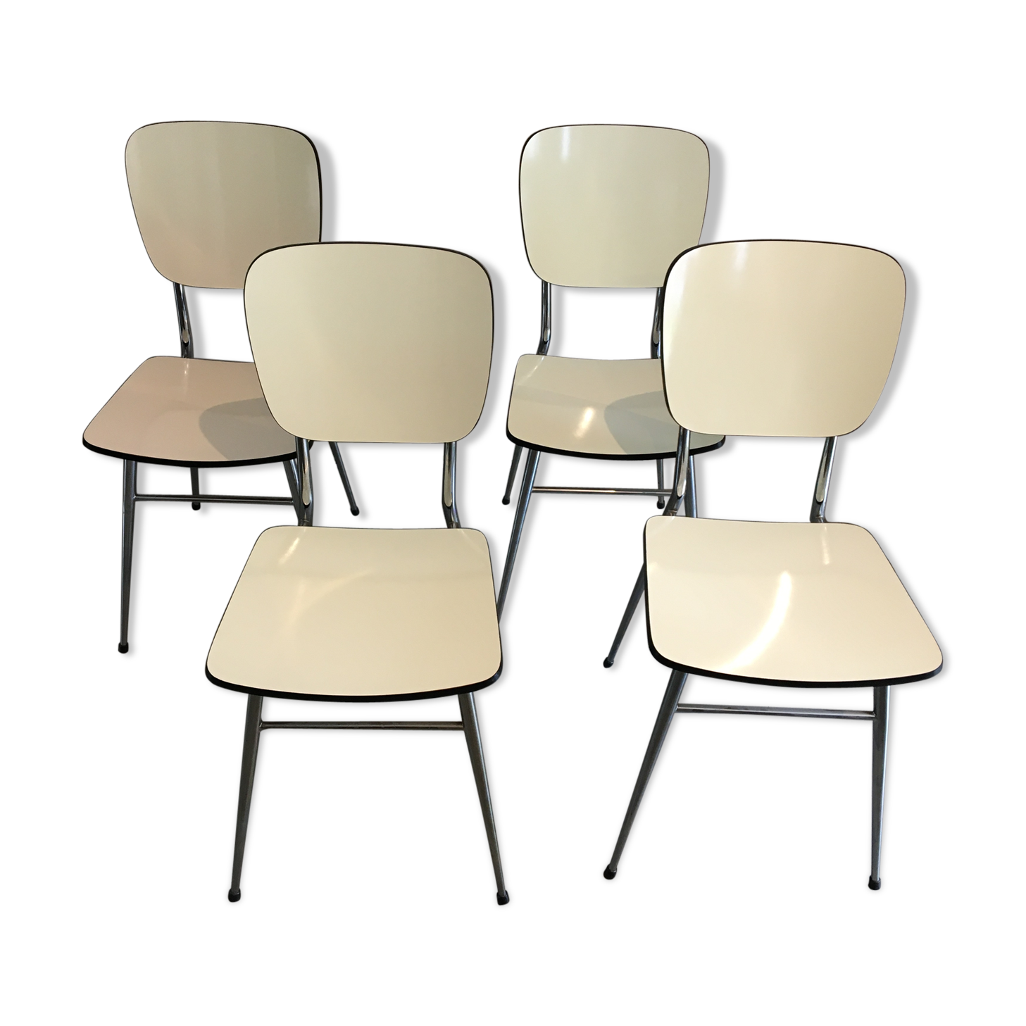Lot of 4 white formica chairs