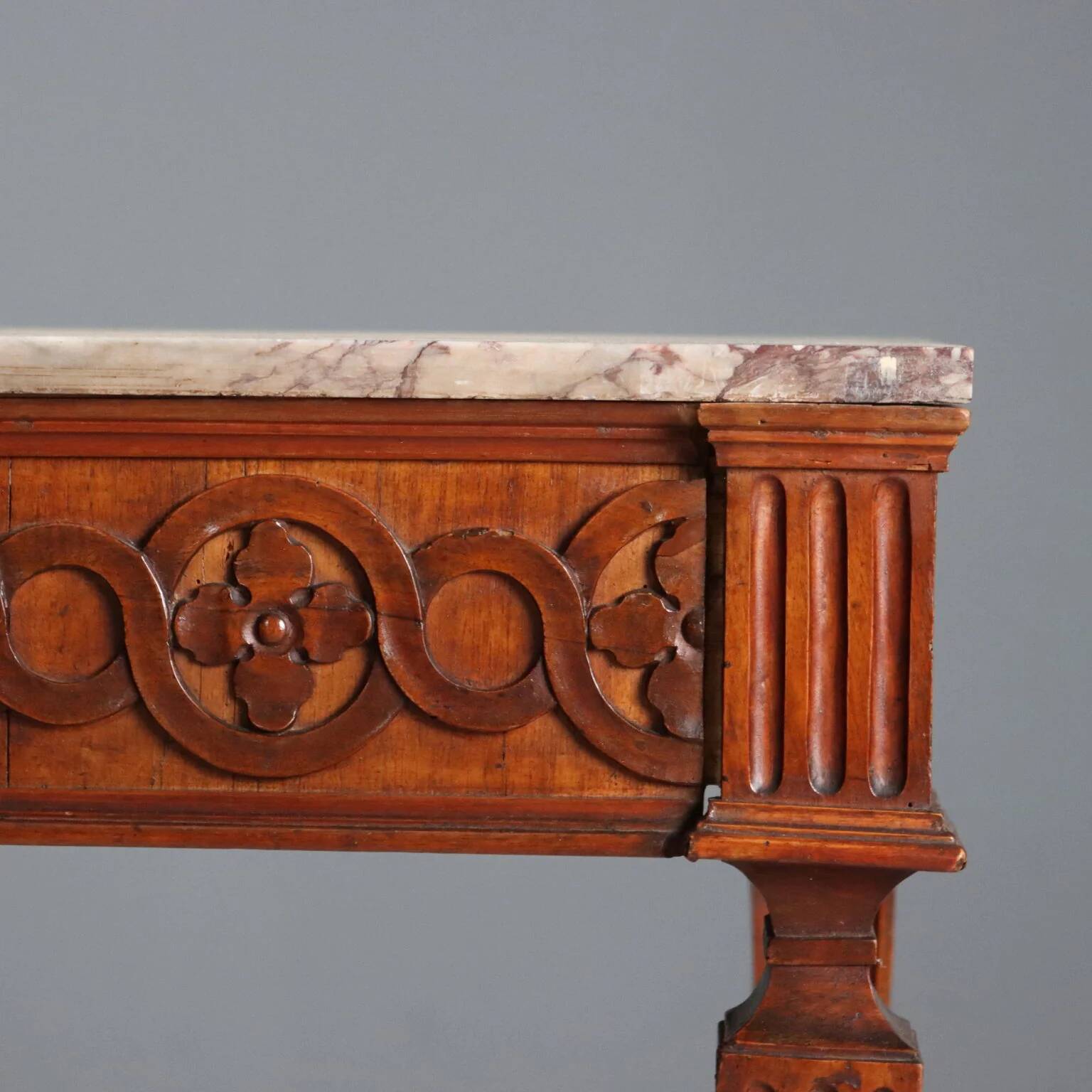 Antique neoclassical console in walnut with a marble top, 18th century.
