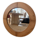 Round Scandinavian pine mirror from the 1970s.