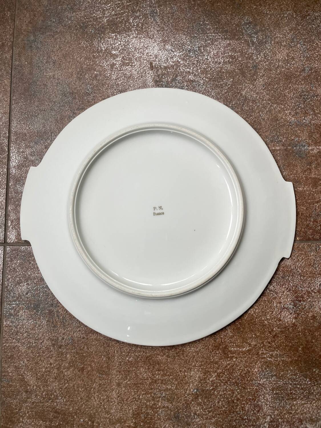Round dish in pn france art deco ceciladon porcelain